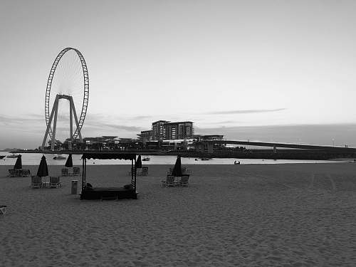 amusement park grayscale photo of umbrellas on beach unnamed road - dubai - united arab emirates